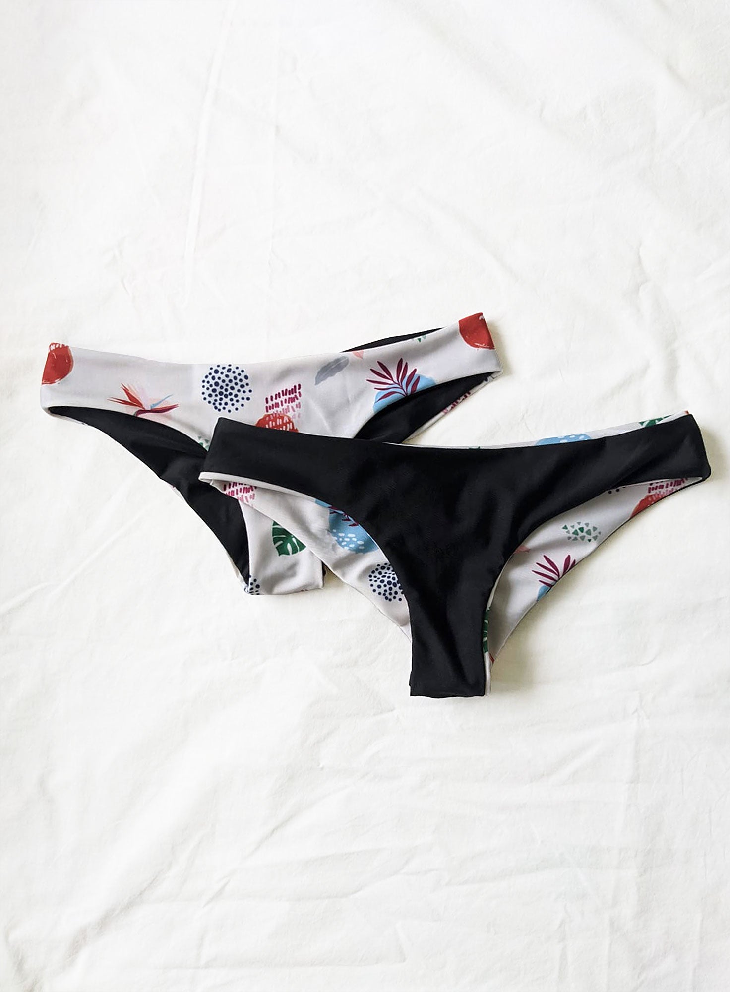 Eve Black/Paradise Print Reversible Cheeky Bikini Bottom-Yindi & Salt-stride